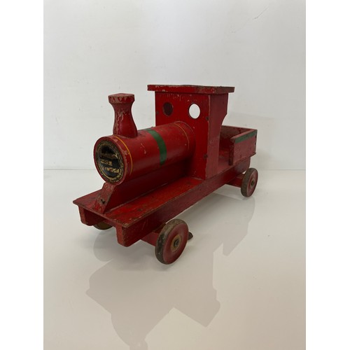 461 - Wooden ride on toy train by Freeway, 39 cm long.

This lot is available for in-house shipping