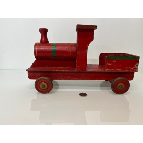 461 - Wooden ride on toy train by Freeway, 39 cm long.

This lot is available for in-house shipping