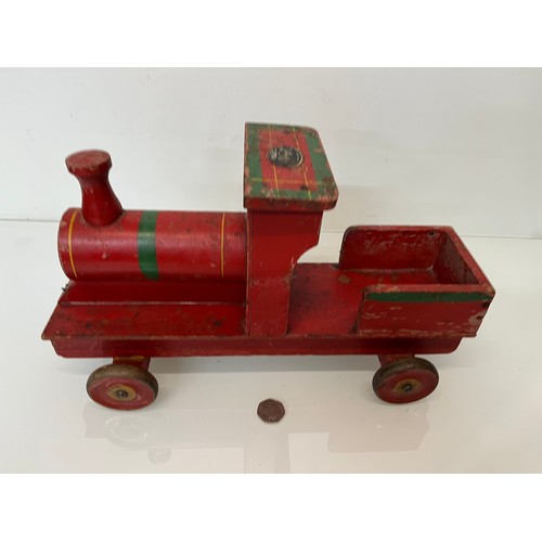 461 - Wooden ride on toy train by Freeway, 39 cm long.

This lot is available for in-house shipping