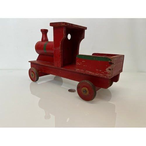 461 - Wooden ride on toy train by Freeway, 39 cm long.

This lot is available for in-house shipping