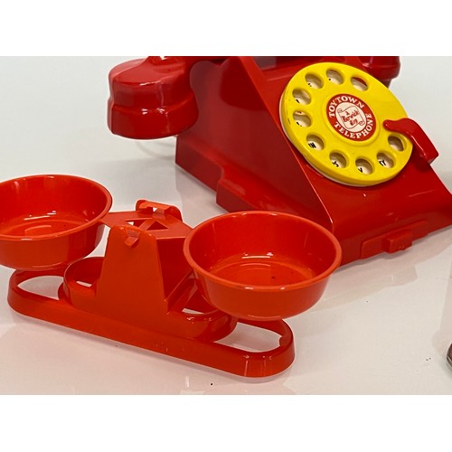 381 - 1970’s plastic toys, a Toy time telephone a set of shop scales and a Mailbox money box.

This lot is... 