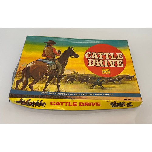 382 - Three vintage board games, US western themed, Cattle Drive, Sorry and Jeu de Paris.

This lot is ava... 