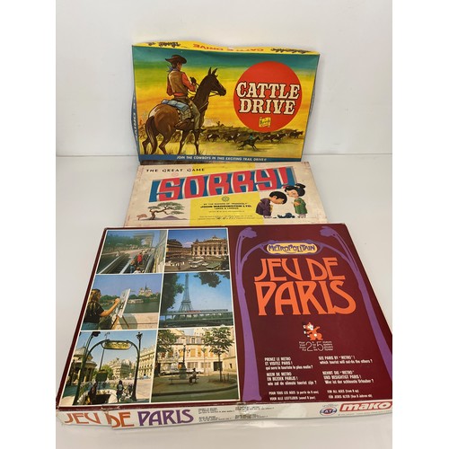 382 - Three vintage board games, US western themed, Cattle Drive, Sorry and Jeu de Paris.

This lot is ava... 