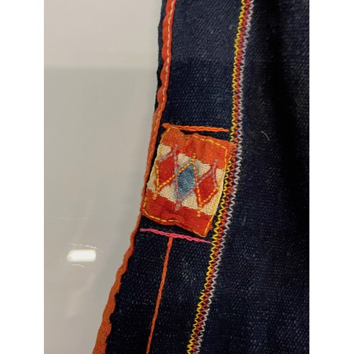 312 - Asian tribal art, an unusual antique jacket from a Hill tribe in Thailand, woven woollen body with d... 