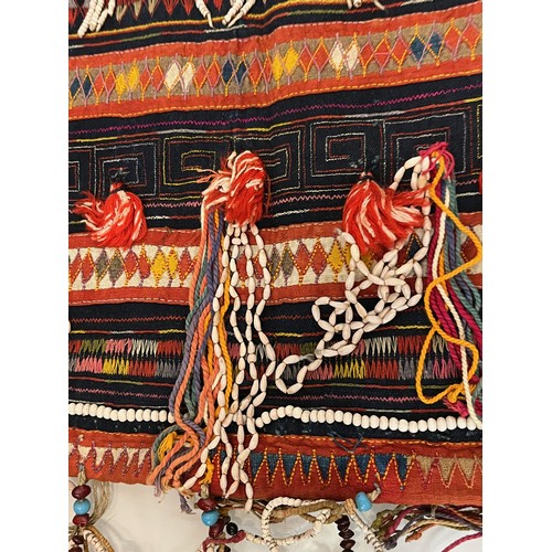 312 - Asian tribal art, an unusual antique jacket from a Hill tribe in Thailand, woven woollen body with d... 