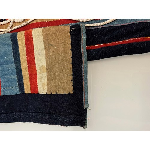 312 - Asian tribal art, an unusual antique jacket from a Hill tribe in Thailand, woven woollen body with d... 