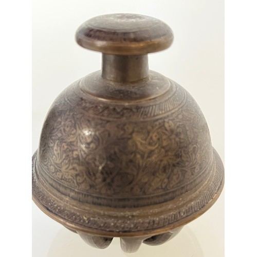 313 - Asian tribal art, two cast bronze and bells with hand chased and enamelled decoration.

This lot is ... 