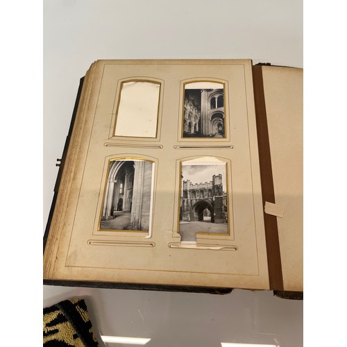 316 - A large early C20th photograph album with pages decorated with botanical illustrations throughout.

... 