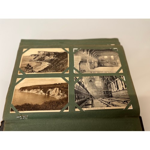 317 - A family collection of over 300 mostly early C20th postcards in a large album and additional loose e... 