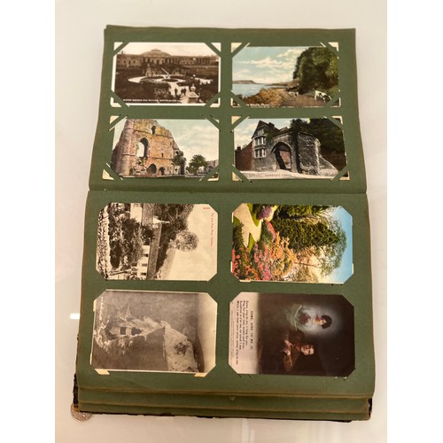 317 - A family collection of over 300 mostly early C20th postcards in a large album and additional loose e... 