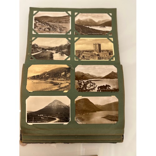 317 - A family collection of over 300 mostly early C20th postcards in a large album and additional loose e... 