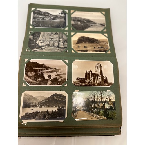 317 - A family collection of over 300 mostly early C20th postcards in a large album and additional loose e... 