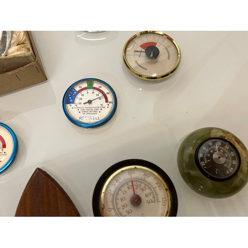 319 - A collection of thermometers with circular dials. 11 in all.

This lot is available for in-house shi... 