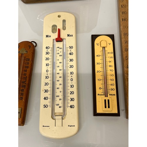 321 - A collection of Thermometers and barometers, 8 in all.

This lot is available for in-house shipping