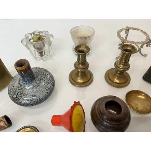 323 - Mixed lot of mother of pearl items clay pipes candle sticks etc.

This lot is available for in-house... 