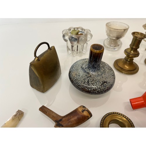 323 - Mixed lot of mother of pearl items clay pipes candle sticks etc.

This lot is available for in-house... 