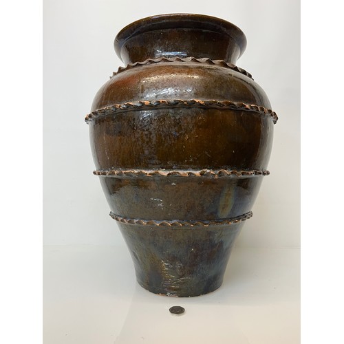 325 - Large glazed terracotta pot  52 cm high.

This lot is collection only.