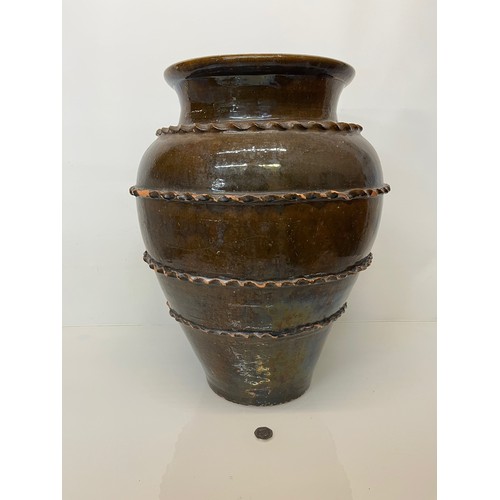 325 - Large glazed terracotta pot  52 cm high.

This lot is collection only.