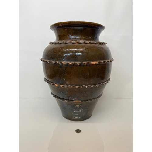 325 - Large glazed terracotta pot  52 cm high.

This lot is collection only.