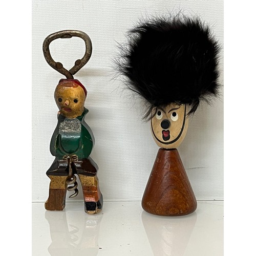 326 - Folk art bottle opener and another with a guardsman in a bear skin with a cork screw.


This lot is ... 