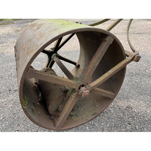 329 - Architectural gardening salvage, a large Victorian cast iron lawn roller. Weighted counterbalance so... 