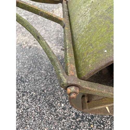 329 - Architectural gardening salvage, a large Victorian cast iron lawn roller. Weighted counterbalance so... 