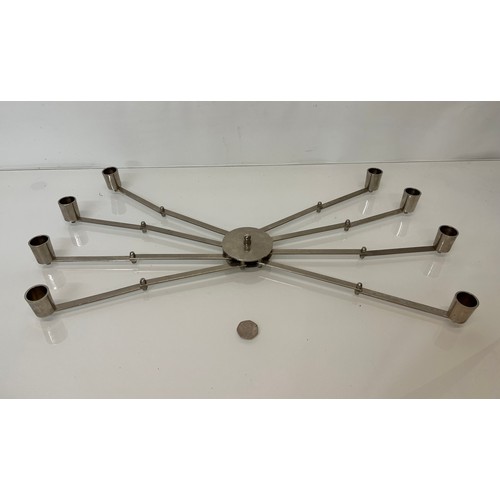 334 - An Art Deco articulated candelabra chrome plated finish. 22 inch span.

This lot is available for in... 