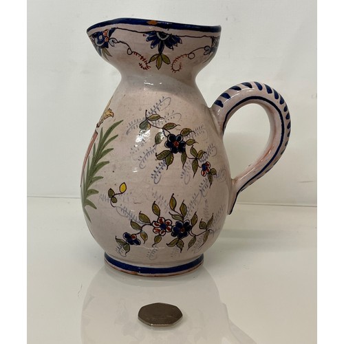 343 - Pottery jug with painted coat of arms to the front.
18 cm tall.
This lot is available for in-house s... 