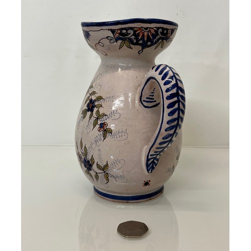 343 - Pottery jug with painted coat of arms to the front.
18 cm tall.
This lot is available for in-house s... 