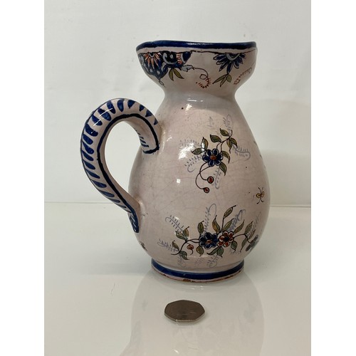 343 - Pottery jug with painted coat of arms to the front.
18 cm tall.
This lot is available for in-house s... 