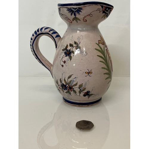 343 - Pottery jug with painted coat of arms to the front.
18 cm tall.
This lot is available for in-house s... 