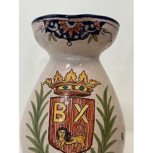 343 - Pottery jug with painted coat of arms to the front.
18 cm tall.
This lot is available for in-house s... 