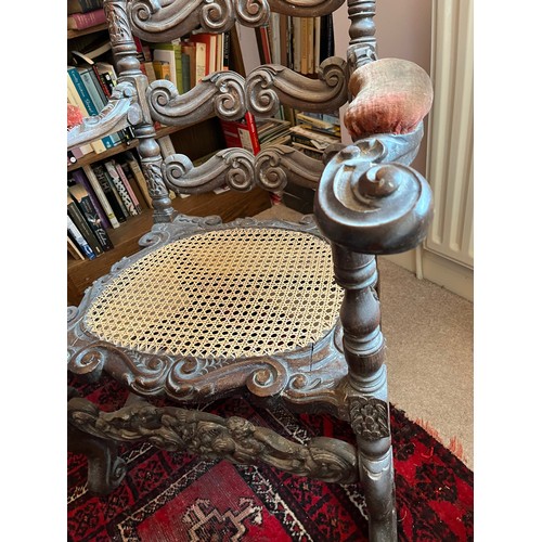 1 - Decorative antique furniture, a hand carved high backed armchair with a cane seat section and uphols... 