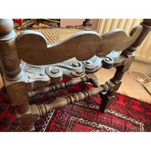 1 - Decorative antique furniture, a hand carved high backed armchair with a cane seat section and uphols... 