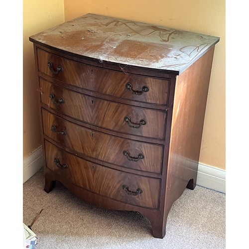 5 - Bow fronted chest of four drawers of small proportions, 61 cm wide x 46 cm deep 73 cm high.

This lo... 