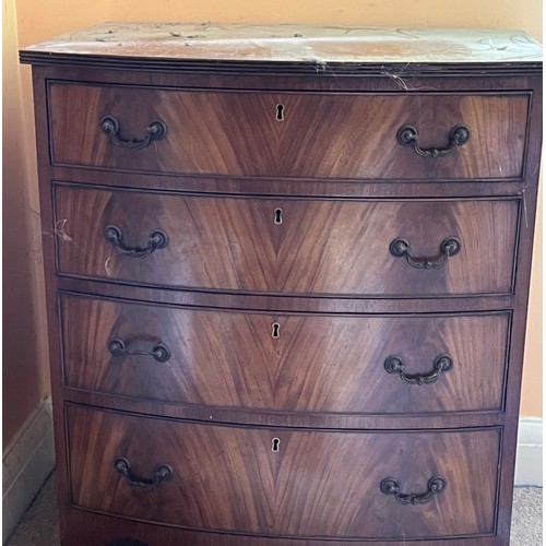 5 - Bow fronted chest of four drawers of small proportions, 61 cm wide x 46 cm deep 73 cm high.

This lo... 