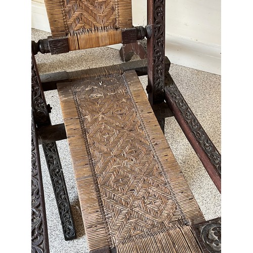 13 - Anglo Indian folding chair with carved decoration.

This lot is collection only