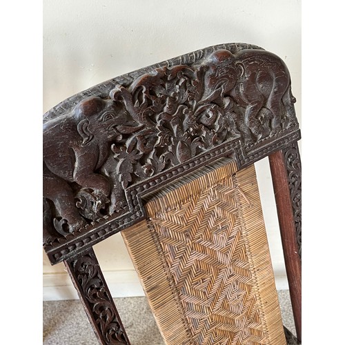 13 - Anglo Indian folding chair with carved decoration.

This lot is collection only