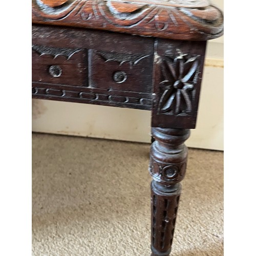 16 - A hand caved side table with an oak top, 35 cm x 29 cm x 38 cm high.

This lot is available for in-h... 