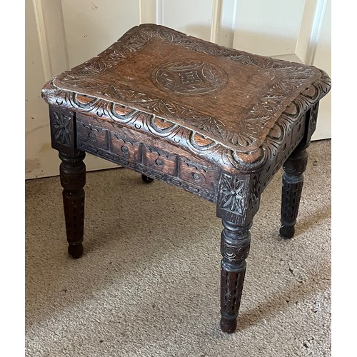 16 - A hand caved side table with an oak top, 35 cm x 29 cm x 38 cm high.

This lot is available for in-h... 