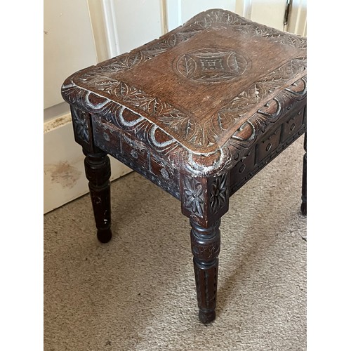 16 - A hand caved side table with an oak top, 35 cm x 29 cm x 38 cm high.

This lot is available for in-h... 