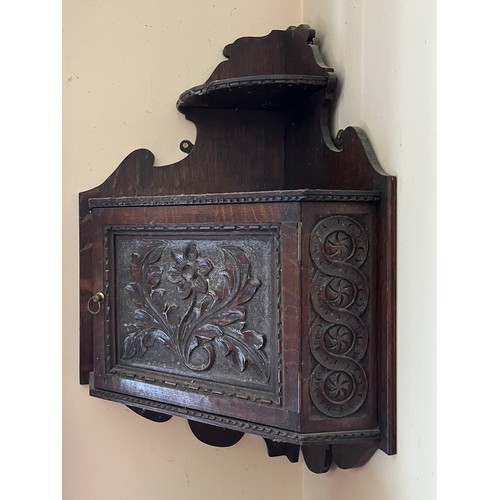 18 - Oak corner cupboard with carved decoration, 

This lot is collection only