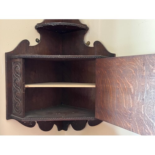 18 - Oak corner cupboard with carved decoration, 

This lot is collection only