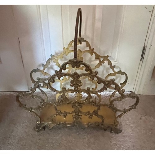 19 - Metal magazine rack with cast brass sides, 44 cm long x 47 cm high.

This lot is collection only