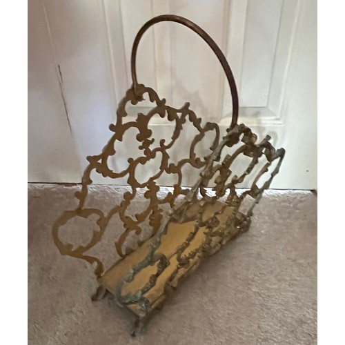 19 - Metal magazine rack with cast brass sides, 44 cm long x 47 cm high.

This lot is collection only