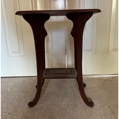 21 - A two tier side table with carved Chinoserie decoration of a Dragon and Turtles, 41 cm x 26 cm x 51.... 