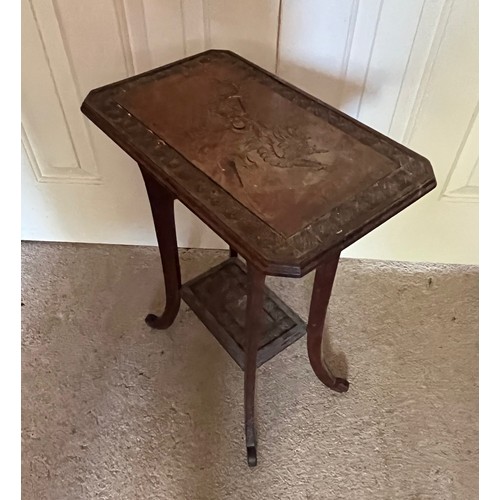 21 - A two tier side table with carved Chinoserie decoration of a Dragon and Turtles, 41 cm x 26 cm x 51.... 