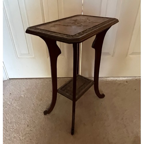 21 - A two tier side table with carved Chinoserie decoration of a Dragon and Turtles, 41 cm x 26 cm x 51.... 