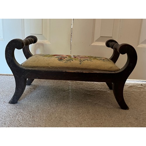 23 - An upholstered foot stool with a floral tapestry top. 46 cm x 24 cm x 24 cm high.

This lot is avail... 