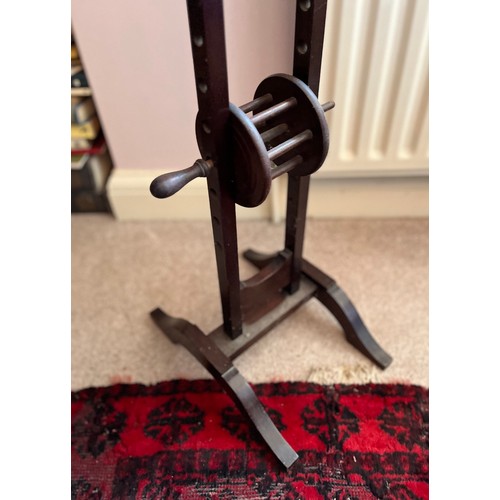 29 - A mahogany yarn winder 114 cm high x 24 cm wide.

This lot is collection only